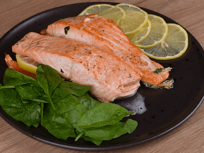 Salmon with Butter and Spinach Leaves