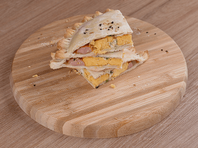 Baked Snack Stuffed with Hot Dogs and Eggs