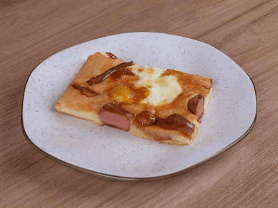 Oven-Baked Pancake with Hot Dog Sausages and Bacon