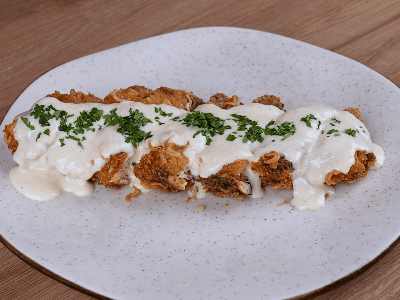 Breaded Chicken with Cheese Sauce
